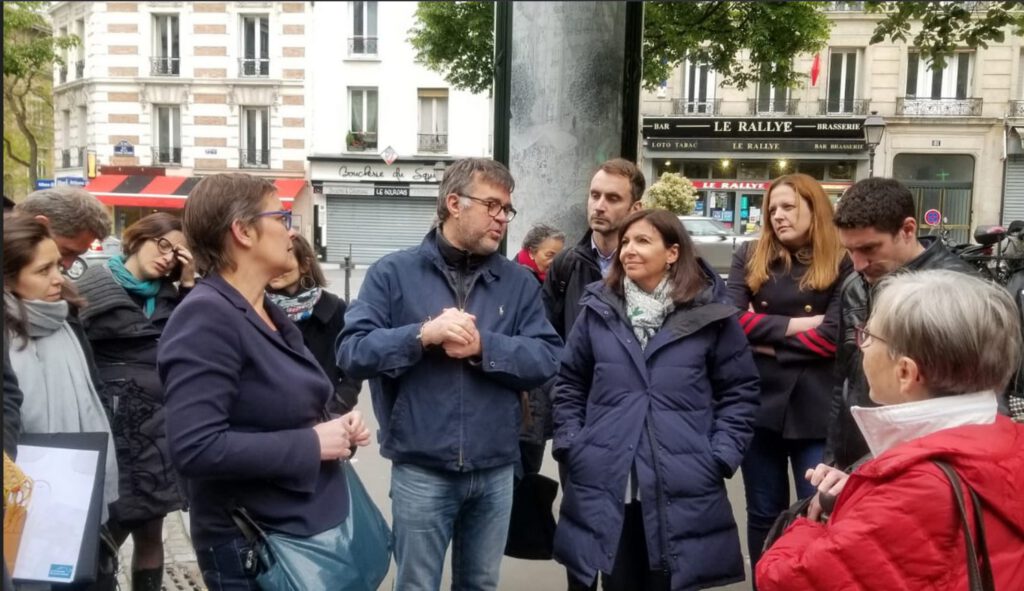 Verkehrswende, Mobilitätswende, IAA 2025, Drei Minuten Stadt, 15 Minuten Stadt, Paris, Verkehrskontor FrankfurtRheinMain, Jürgen Schultheis, VDA, Fußverkehr, Radverkehr, Andreas Rade, Jan Schilling, Totinia Hörner, Anne Hidalgo, Patrick Bernard, Republic of superneighbors
